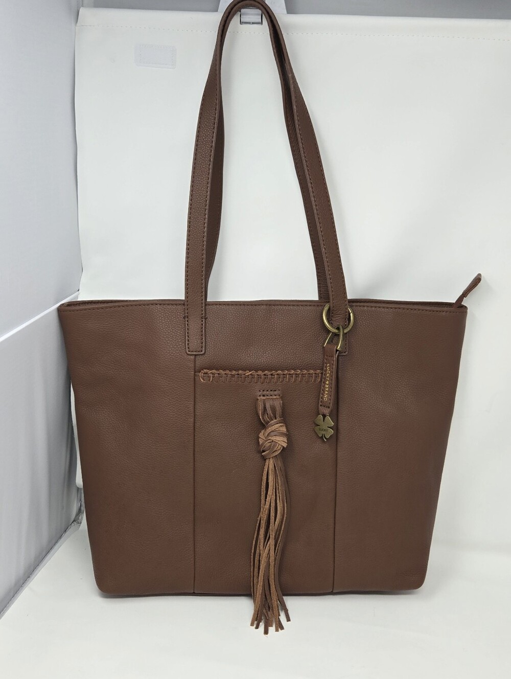 Lucky Brand Brown Shoulder Bag Lined Pockets Tassel & Bag Charm 100% Leather